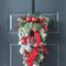Glitzhome® 25" Flocked Berry, Ornament & Pinecone Ribbon Teardrop